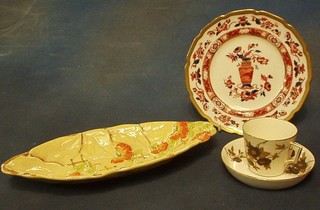 A Victorian porcelain tea cup and saucer with floral decoration, a leaf shaped dish and 1 other