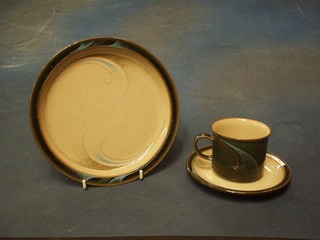 a 28 piece Denby dinner/tea service, brown glazed with blue swirls, comprising 9 dinner plates 10", 5 side plates 8 1/2", 4 tea plates 7", 5 cups and 5 saucers
