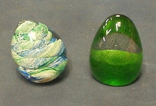 An Underdale blue glass paperweight 3" and a green glass paperweight 3"