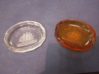 A Baccarat glass ashtray decorated a galleon 4" and an amber Baccarat glass ashtray 4" (chipped) 
