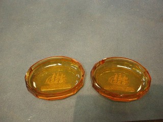 2 Baccarat amber tinted ashtrays 4" (chipped)