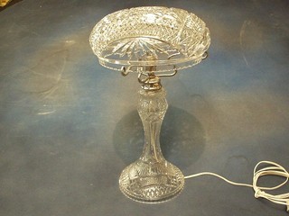 An Art Deco cut glass table lamp with cut glass shade