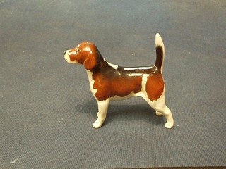 A Beswick figure of a standing beagle 2 1/2"