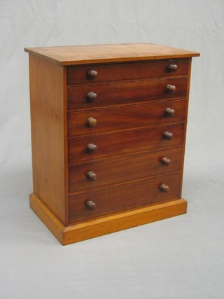 A Victorian mahogany collectors chest of 6 long drawers with tore handles, raised on a platform base, 50" 