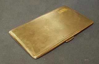 A silver cigarette case with engine turned decoration Birmingham 1964, 6 ozs