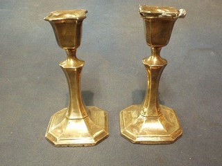 A pair of silver candlesticks raised on octagonal bases (1 sconce f), Chester 1926 6"