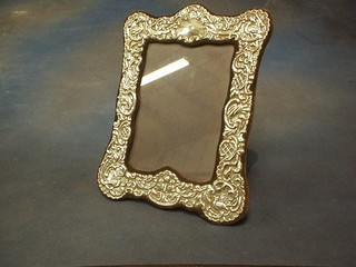 A modern rectangular embossed silver easel photograph frame 12"
