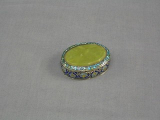 An Eastern "silver" and enamelled trinket box with onyx hinged lid