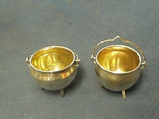 A pair of circular Victorian silver salts in the form of cauldrons with parcel gilt interiors, London 1857, 3 ozs