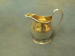 A Georgian style silver cream jug Sheffield 1919, 3 ozs