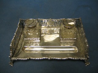 A Victorian pierced silver 2 bottle standish with pen receptical, raised on panel supports (marks to the front slightly rubbed and split to front) together with 2 cut glass inkwells (1 hinge f) 8"