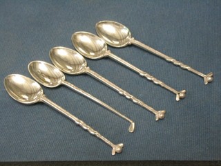5 silver teaspoons decorated golf clubs and balls  Birmingham 1933 and 1939, 2 ozs