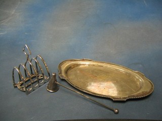 An oval silver plated tray 13", a do. 5 bar toast rack and do. candle snuffer