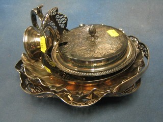 A circular silver plated butter dish and cover, an hors d'eouvres dish and a pierced silver plated basket etc