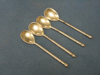 4 Continental silver "picture" back spoons