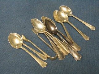 5 Art Deco silver coffee spoons, a pair of silver sugar tongs and 6 Continental silver coffee spoons
