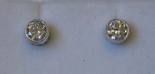A pair of lady's diamond ear studs (approx 0.40ct)