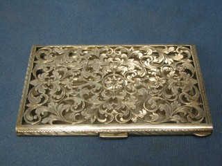 A pierced and engraved American silver cigarette case marked 800 by Peruzzi, 6 ozs