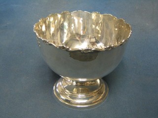 A circular silver pedestal bowl with armorial decoration London 1862 (marks rubbed and thin) 9 ozs