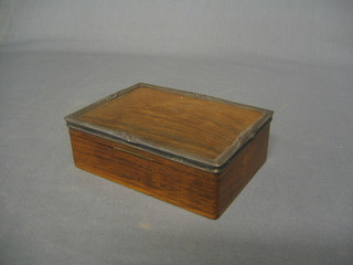 A Continental wooden cigarette box with hinged lid, silver mounts marked 925 5 1/2"