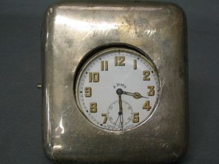 A  19th Century 8 day travelling time piece with Arabic numerals contained in a nickel case with silver outer easel case, London 1867