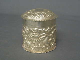 A circular Victorian embossed silver dressing table jar London 1897, 4 1/2 ozs (some light damage to base)