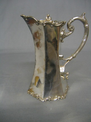 A Victorian waisted octagonal Britannia metal hotwater jug 