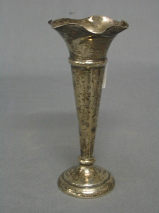 A waisted silver specimen vase raised on a circular spreading foot (marks rubbed and some dents) 5 1/2"