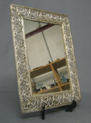 A 19th rectangular plate mirror contained in a Persian pierced frame