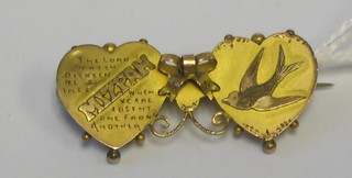 A gilt metal  heart  shaped brooch marked Nizpah