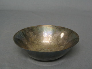 A circular planished silver plated bowl by the Duchess of Sutherland Cripples Guild, the base marked WM 5"
