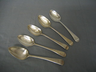 5 various George III silver Old English pattern pudding spoons London 1812, 1810 and 1823, 6 ozs