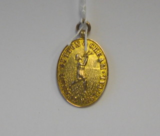 A 9ct gold Sutton & Cheam Music Festival medal