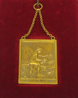 A 15ct gold music medal, cased