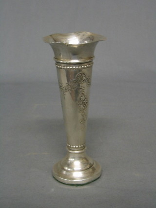An embossed silver trumpet shaped vase, hallmarked Chester