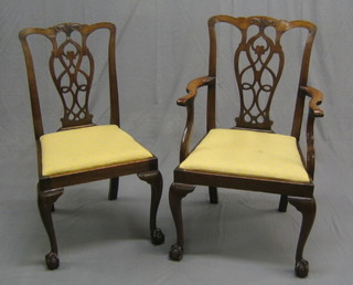 A set of 10 19th Century mahogany framed Chippendale style dining chairs with pierced vase shaped slat backs, carved cresting rails and upholstered drop in seats, raised on cabriole supports (no broken legs but all frames loose)