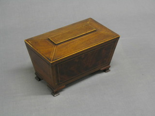 A Georgian inlaid mahogany twin compartment tea caddy of sarcophagus form (some inlay missing) and raised on later ogee bracket feet 10 1/2"