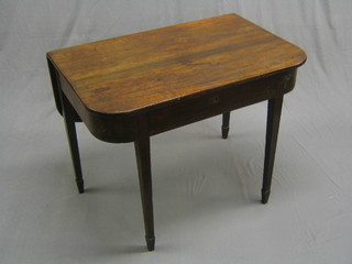 A Victorian mahogany D shaped gate leg table, fitted a drawer and raised on square tapering supports 36"