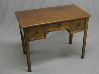 A Georgian mahogany low boy fitted 1 long and 2 short drawers, raised on square tapering supports 36"
