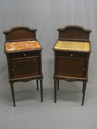 A pair of 19th Century French walnut bedside cabinets, 1 with pink marble top and 1 without, fitted a drawer, enclosed by cupboards raised on turned supports with gilt metal mounts throughout 18"