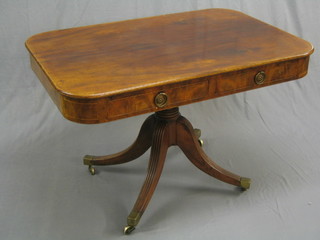 A 19th Century mahogany pedestal library table inlaid satinwood stringing, fitted 2 drawers, raised on a turned column and tripod base ending brass caps and castors 45"