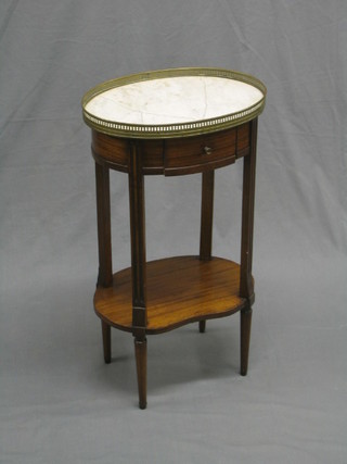 A 19th Century oval French walnut occasional table with white veined marble top (cracked) and gilt gallery, fitted a drawer and raised on fluted supports 16"