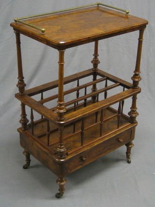 A Victorian inlaid and figured walnut Canterbury what-not with brass rail, the base fitted a 3 division Canterbury with drawer to base, raised on ceramic castors 24"