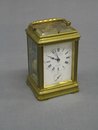 An 8 day repeating carriage alarm clock by LeRoy & Fils striking on 2 gongs, contained in a gilt metal case, the dial with Roman numerals and LeRoy Fils 57 New Bond Street, Made in France and to the underneath Palais Royal Paris, (removed from a Sussex House Clearance), dial and glass in excellent condition throughout, possible replacement platform  