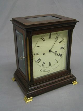 A 19th Century double fusee bracket clock, striking on bell, with carriage clock platform to the top, contained in a rosewood and glass case, the  6 1/2" square painted dial painted Roman numerals by J Murray of London (dial crazed and slight chip to left hand base)