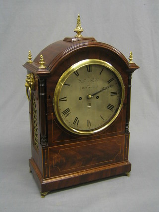 A 19th Century Scots 8 day double fusee  bracket clock, striking on bell, the 8 1/2" circular silvered dial with Roman numerals and day aperture, by William Robb of Montrose, with plain pendulum bob, (movement recently cleaned) with gilded arch shaped solid panel to the side, raised on bracket feet, contained in an inlaid mahogany arch shaped case, with replacement gilt metal finials (re-polished, movement not original)