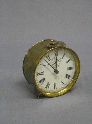 A 20th Century alarm clock the clatter by Ansonia Clock Co. contained in a brass case 5"