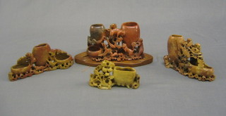4 various soap stone brush pots