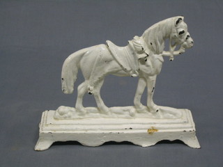 A Victorian cast iron door stop in the form of a standing horse 10"
