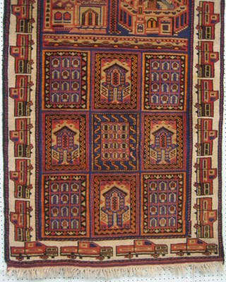 A contemporary Belouch rug decorated buildings and with stylised vehicles to the edge 85" x 35"